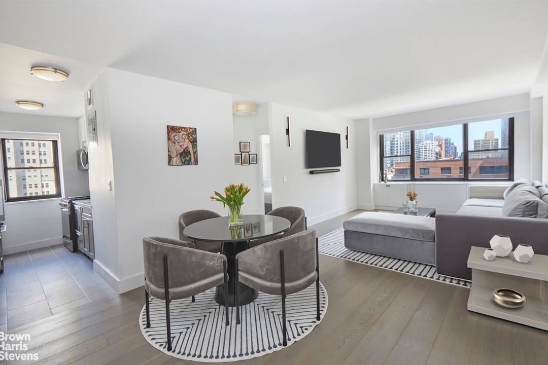 Rarely does such a beautifully renovated, high floor corner apartment come on the market in The Eastwinds Condominium.
