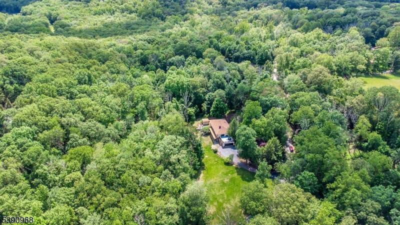 Nestled on 2. 85 private, wooded acres, this spacious 5 bedroom, 3 bath custom raised ranch offers a tranquil outdoor setting and plenty of potential.