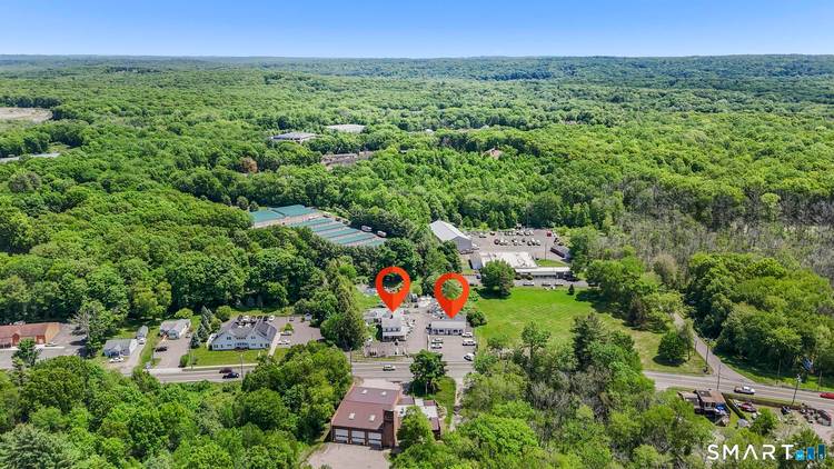 Exceptional mixed use investment opportunity with tremendous upside potential on Route 25 Main Street.