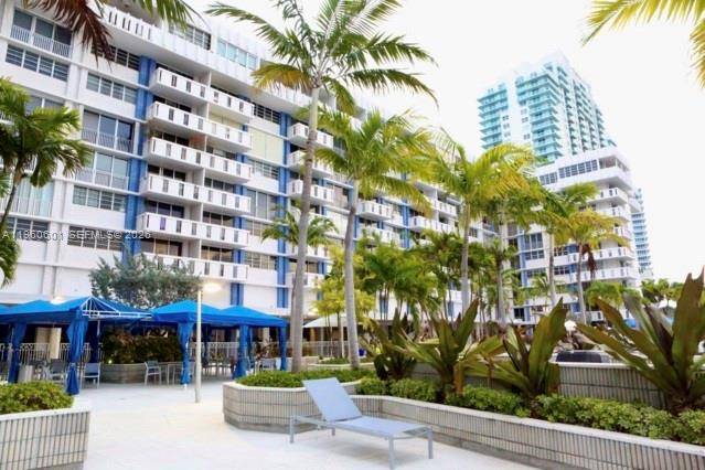 One of the rare direct bayfront units at the South Bay Club Enjoy breathtaking direct views of Biscayne Bay, Port of Miami and Miami Beach Islands from living room and ...