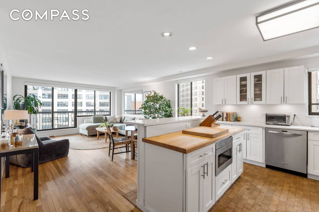 Welcome to this bright, spacious, and tranquil high floor corner residence at 63 Downing Street, complete with a private balcony and city views.