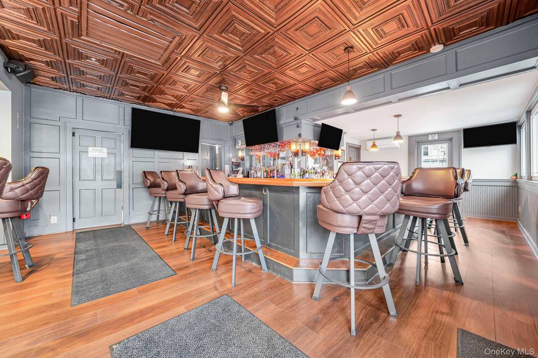 Completely remodeled in 2024, this fully operational restaurant and bar offers a true turn key opportunity in the heart of Greenwood Lake.