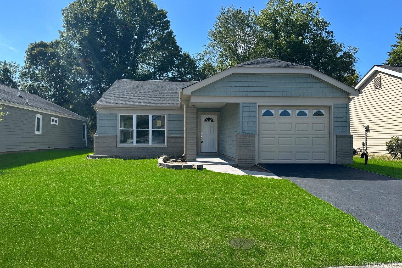 Step into luxury living with this totally gut renovated 2 bedroom, 2 bath Danbury model in the desirable 55 Leisure Knoll community.