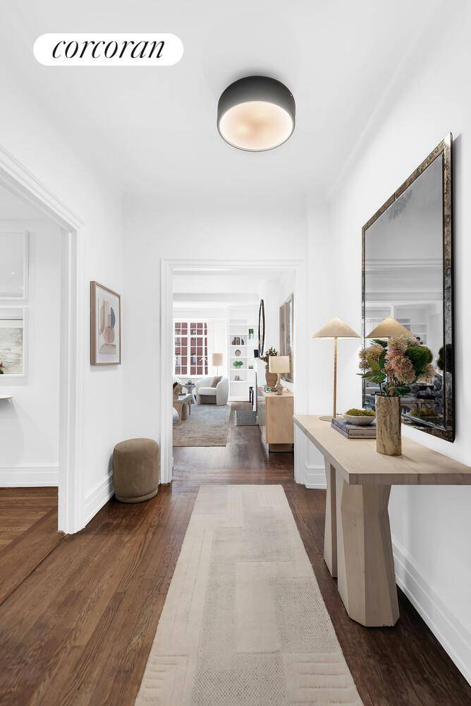 Apartment 6B is a stunning prewar classic six room 2 bedrooms, 3 baths residence that exudes timeless elegance and charm.