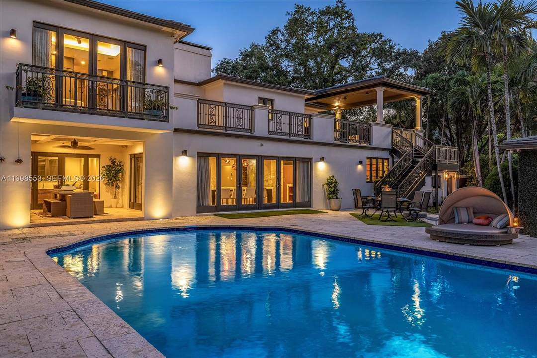 Step into a gated modern estate that delivers the ultimate blend of privacy, design, and resort style living in one of Miami Shores most sought after locations east of Biscayne.