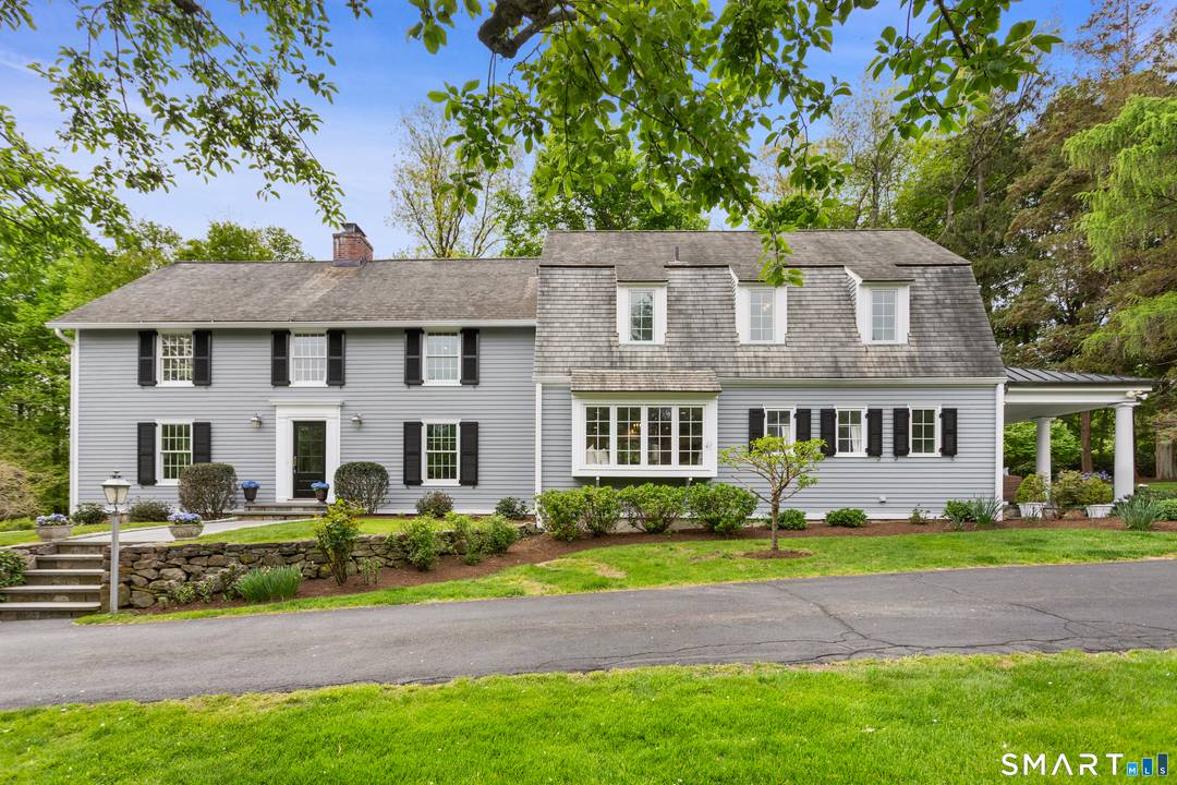 176 Carter Street is a rare retreat tucked down a quiet lane on nearly two park like acres surrounded by mature specimen trees, perennial gardens, and sweeping open lawns.