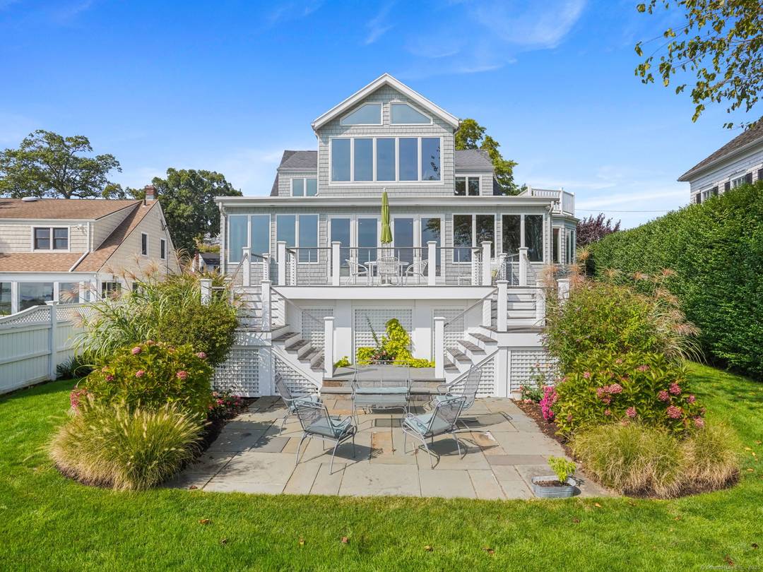 Charming, Curb Appeal Casual Elegance throughout this elevated DIRECT WATERFRONT property !