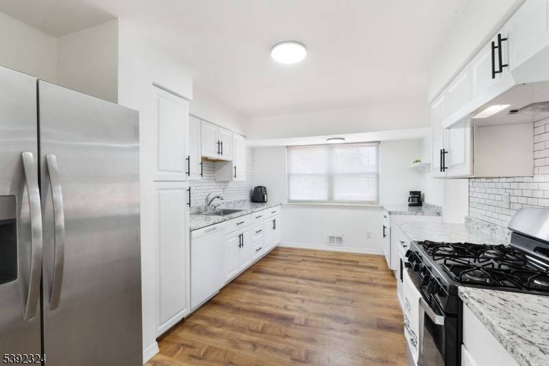 Truly move in home with updates through out the home, NEW BEDROOM WINDOWS being installed, updated kitchen w new gas stove, brand new windows in bedrooms, other windows and sliders ...