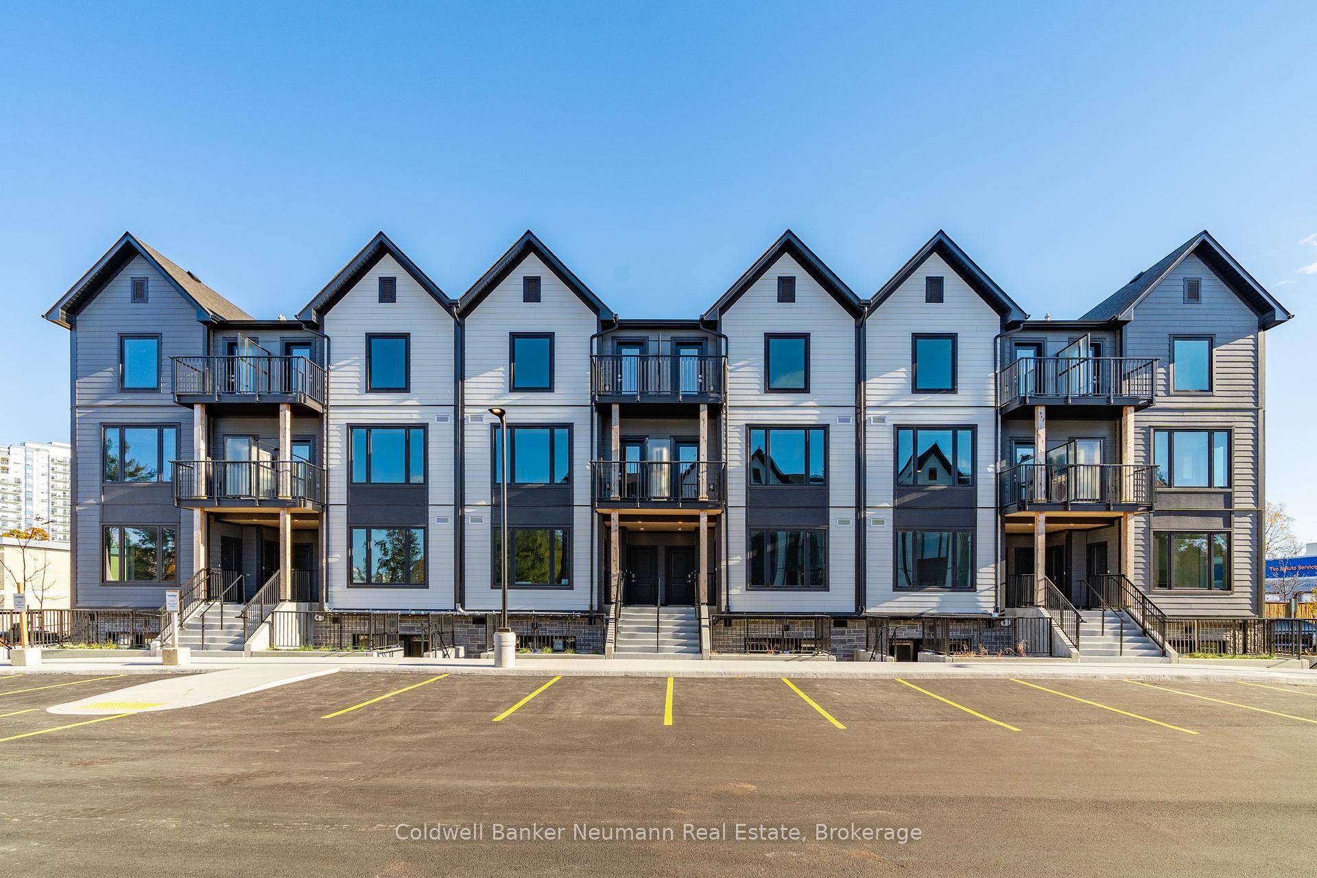 Available January 1st, 2026, this spacious end unit stacked townhouse offers over 900 sq.