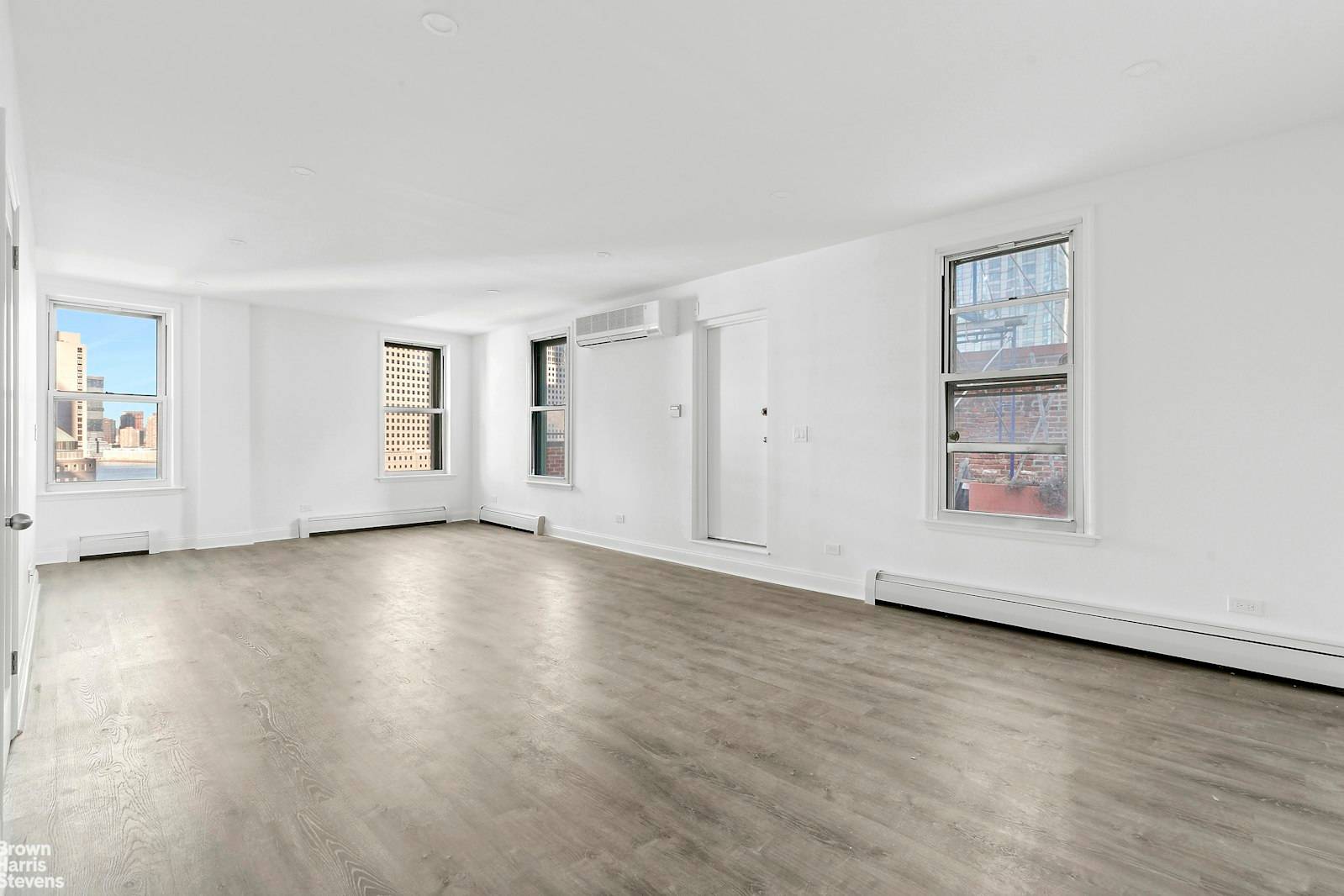 New gut renovation of a unique one of a kind penthouse apartment with large living room, 2 bedrooms, 1 bathroom, laundry room, generous storage space, central air, 14 windows and ...