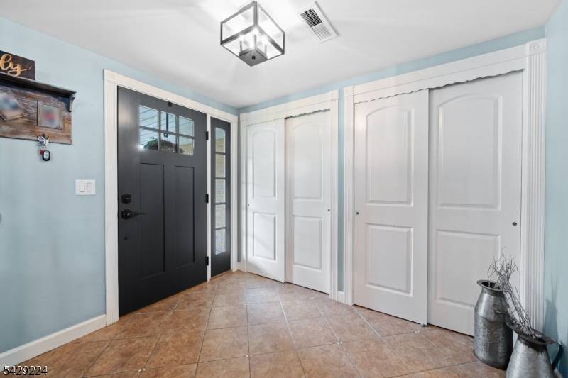 Step into this stunning expanded split level home offering 4 bedrooms and 2.