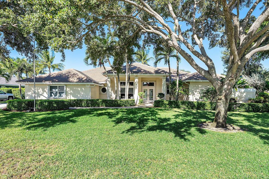 Discover refined Florida living in this beautifully maintained 4 bedroom, 4 bath CBS home nestled on a large lot within the peaceful, gated community of River Ridge.