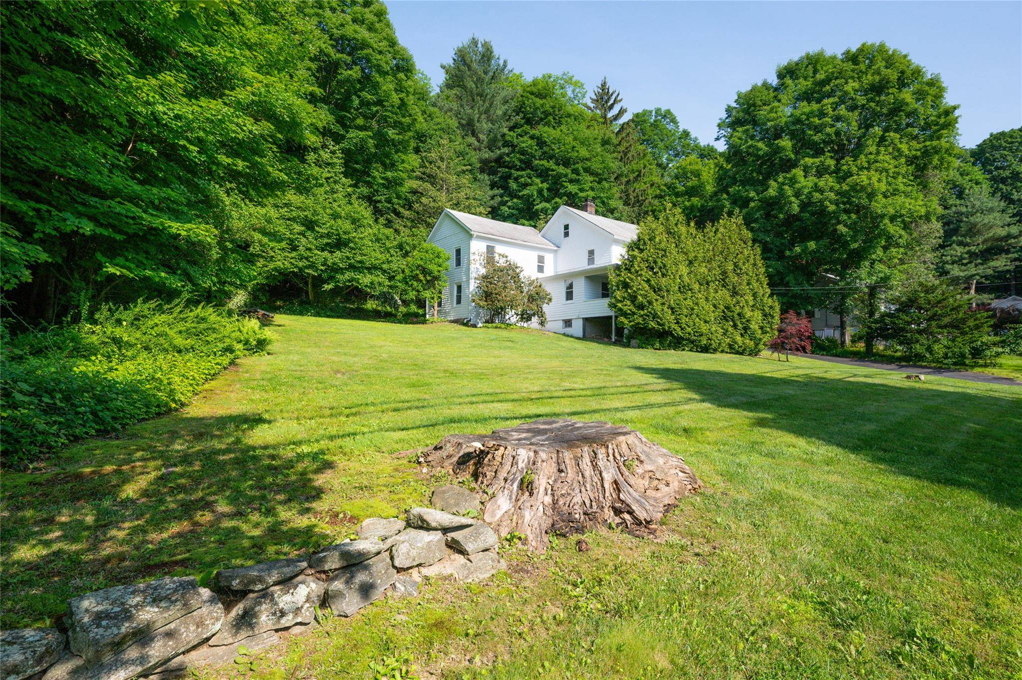 Charming Historic Colonial built in 1870 with original hardwood floors throughout and unique moldings that showcase artisanal craftsmanship from the mid 19th century.