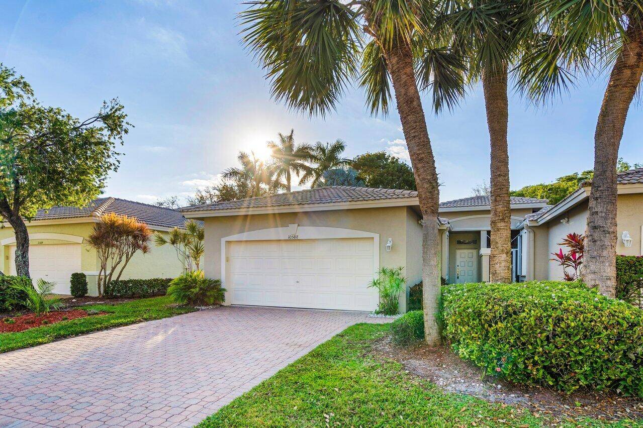 TREAT YOURSELF TO A NEW OPEN CONCEPT KITCHEN WITH SHAKER PULLOUT CABINETS, TILED BACKSPLASH, GRANITE COUNTERS, SOFT CLOSE DRAWERS IN THIS 3 BR 2 BA 2 CAR GARAGE VILLA.
