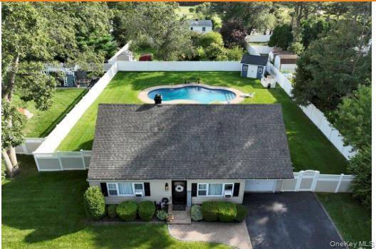 Discover your dream home at 3 Lacebark Lane in Medford, NY !