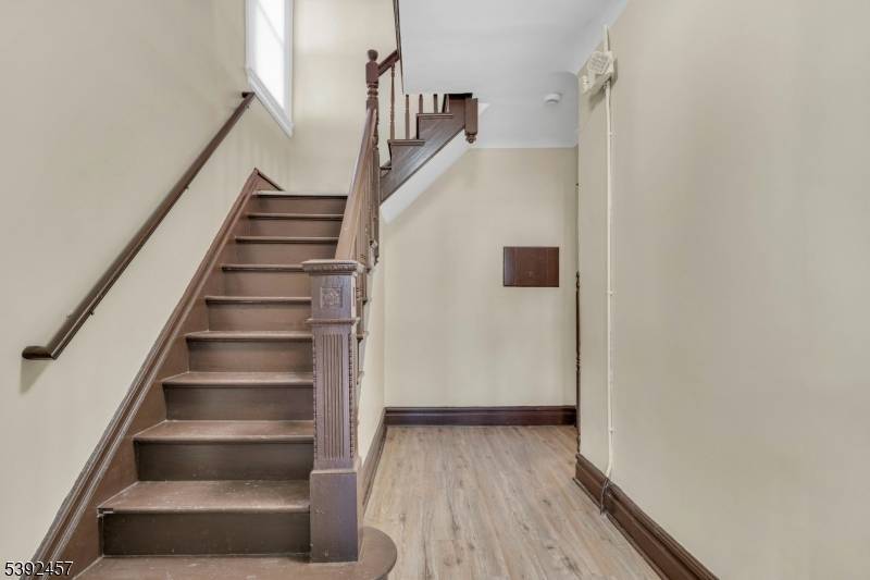 Large 3 Family in Vailsburg Perfect Turnkey Investment Property or for First Time Homeowners Who Want to Live in One Apartment and Collect Rent.