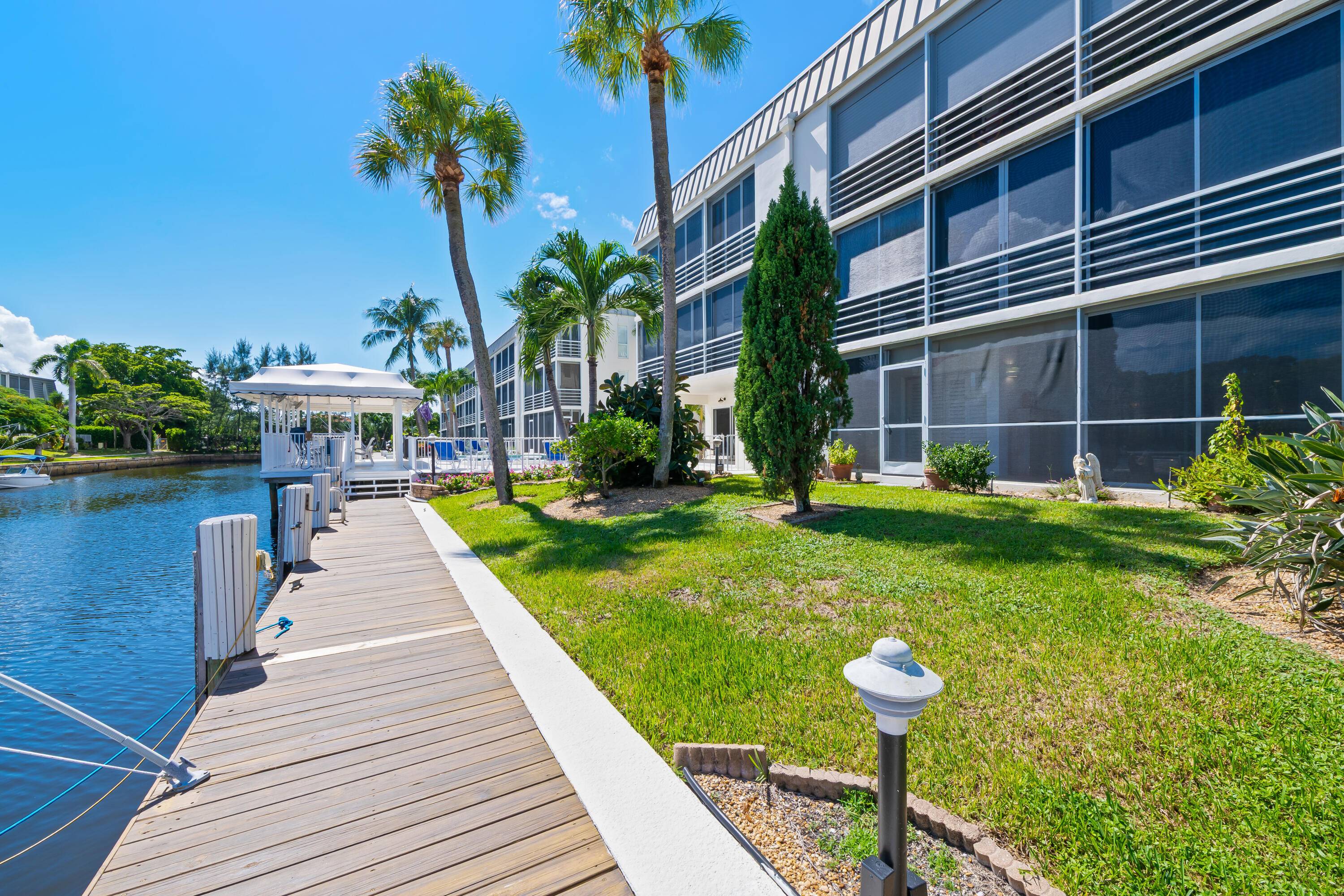 Elevate your coastal lifestyle in this exquisite 2 2 waterfront condo on the East Boca Raton overlooking the dock and canal.