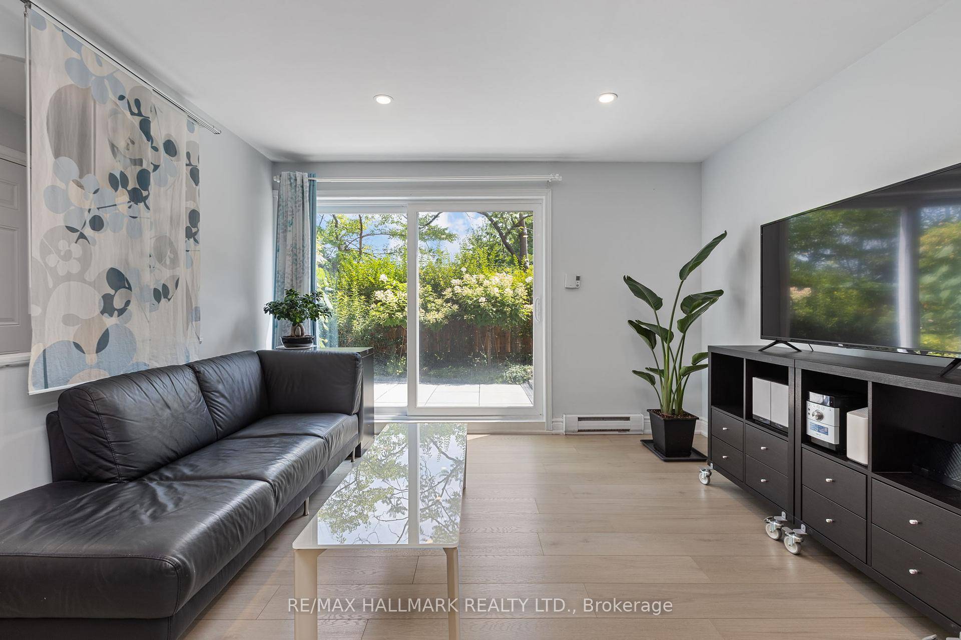 Welcome to this beautifully cared for 2 Storey stacked townhome fts a PRIVATE, SOUTH FACING GARDEN OASIS !