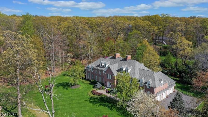 Exquisite 6 bedroom, 5. 1 bath, 4 car garage, Custom Colonial home that features timeless architecture design, with no detail overlooked.