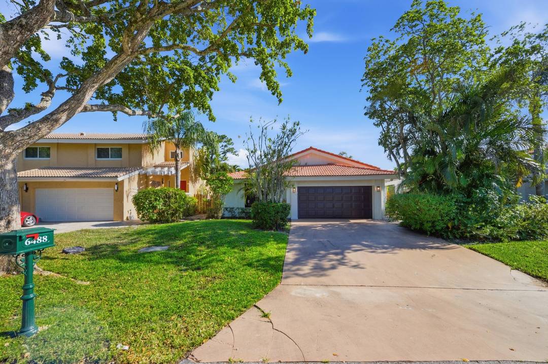 Updated ranch style home featuring a brand new kitchen, hardwood floors, and a spacious layout with 4 bedrooms and 2.