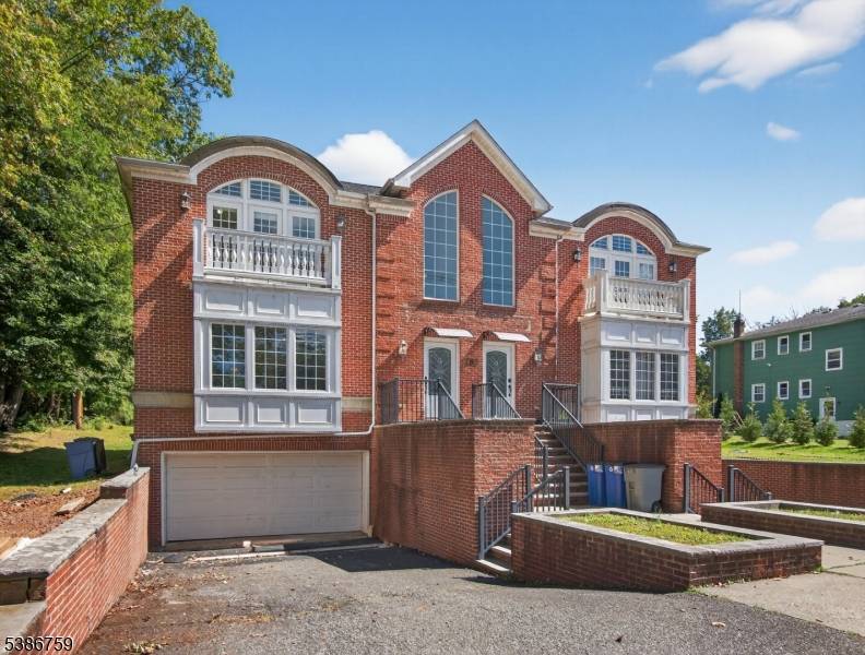 Welcome to this beautifully maintained two family home in the highly sought after New Providence.