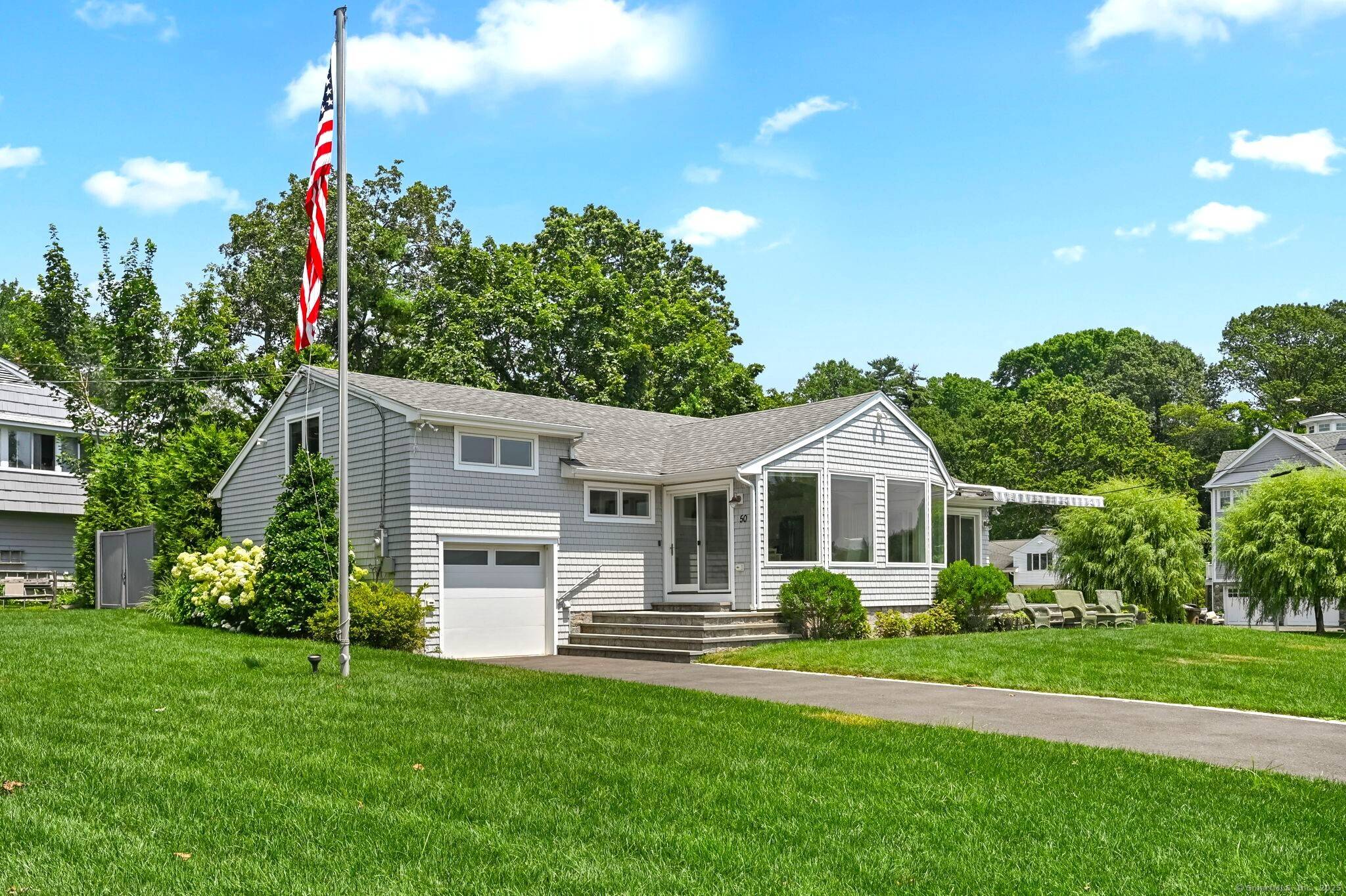Direct Waterfront ! ! Spacious 4 bedroom 2 bath on expansive level fenced in yard patios with sweeping views of Long Island Sound.