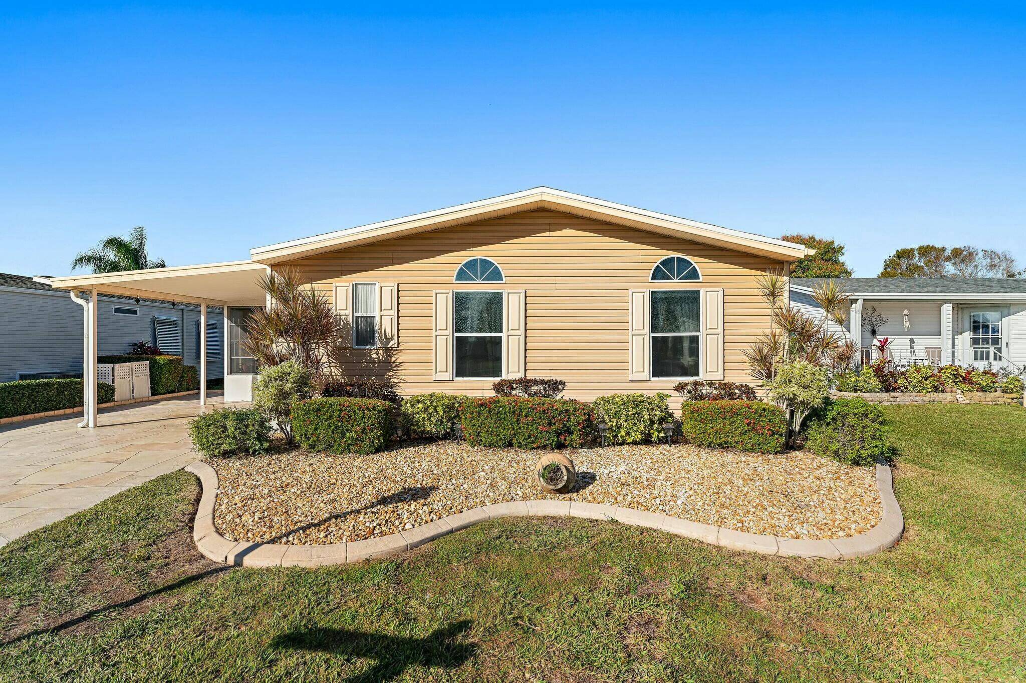 Land Owned Welcome to this charming lakeside 2 bedroom, 2 bath home in the highly sought after Savanna Club 55 community !