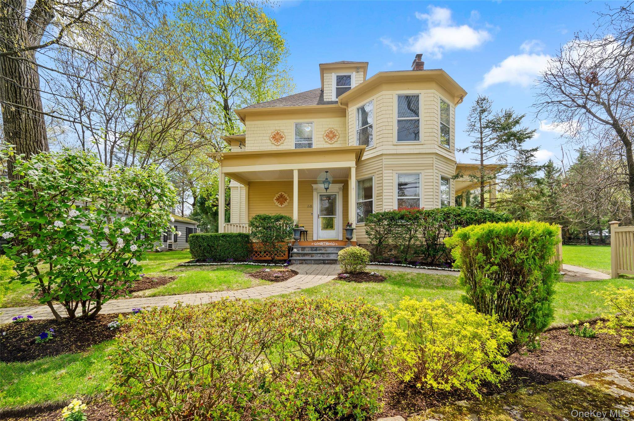 Experience the perfect blend of historic charm and contemporary comfort in this exceptional Edgewood Victorian, nestled on a beautifully landscaped double lot totaling 0.