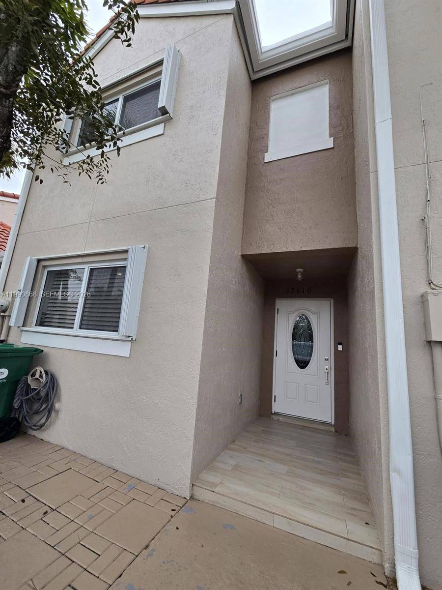 Welcome to your dream townhouse, where modern elegance meets serene waterfront living.