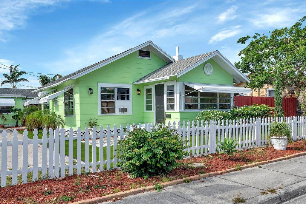 Historic Lake Worth Beach single family home with detached cottage.