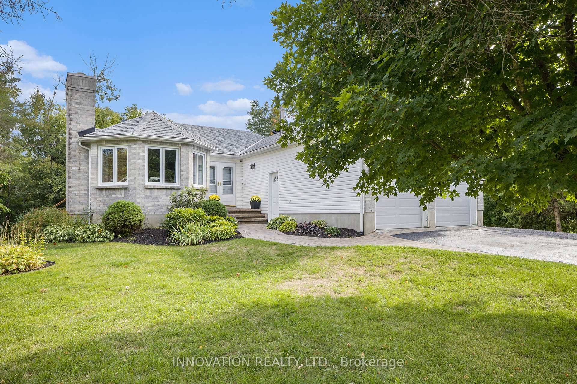 Welcome to this beautifully designed three bedroom, two bath bungalow set in the heart of the charming village of Osgoode.