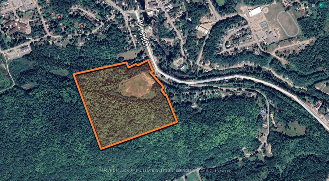 Development land opportunity on Mill Street in Bancroft, Ontario, offering flexibility for a range of potential uses, including seniors housing, townhomes, hotel, and commercial retail development.