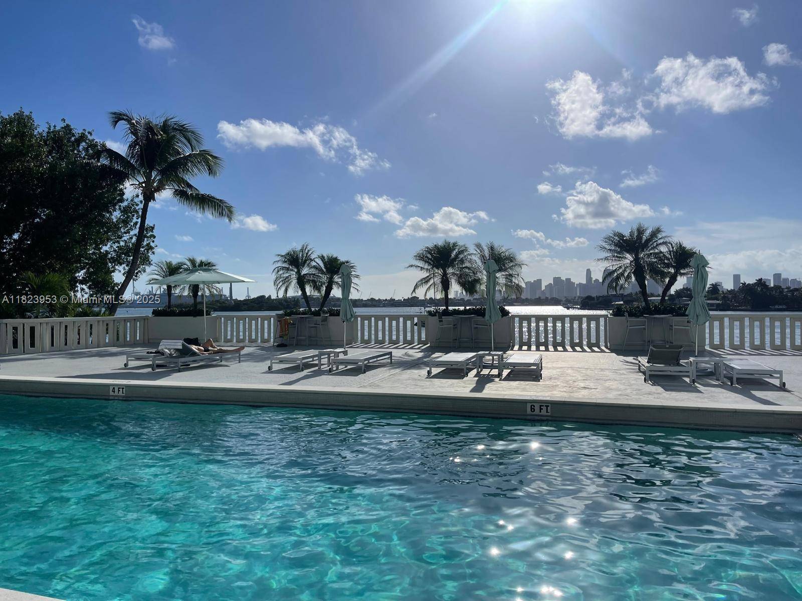 Welcome to Unit 5G at the prestigious Five Island Avenue, an elegant boutique building perfectly situated in the highly sought after Venetian Islands.