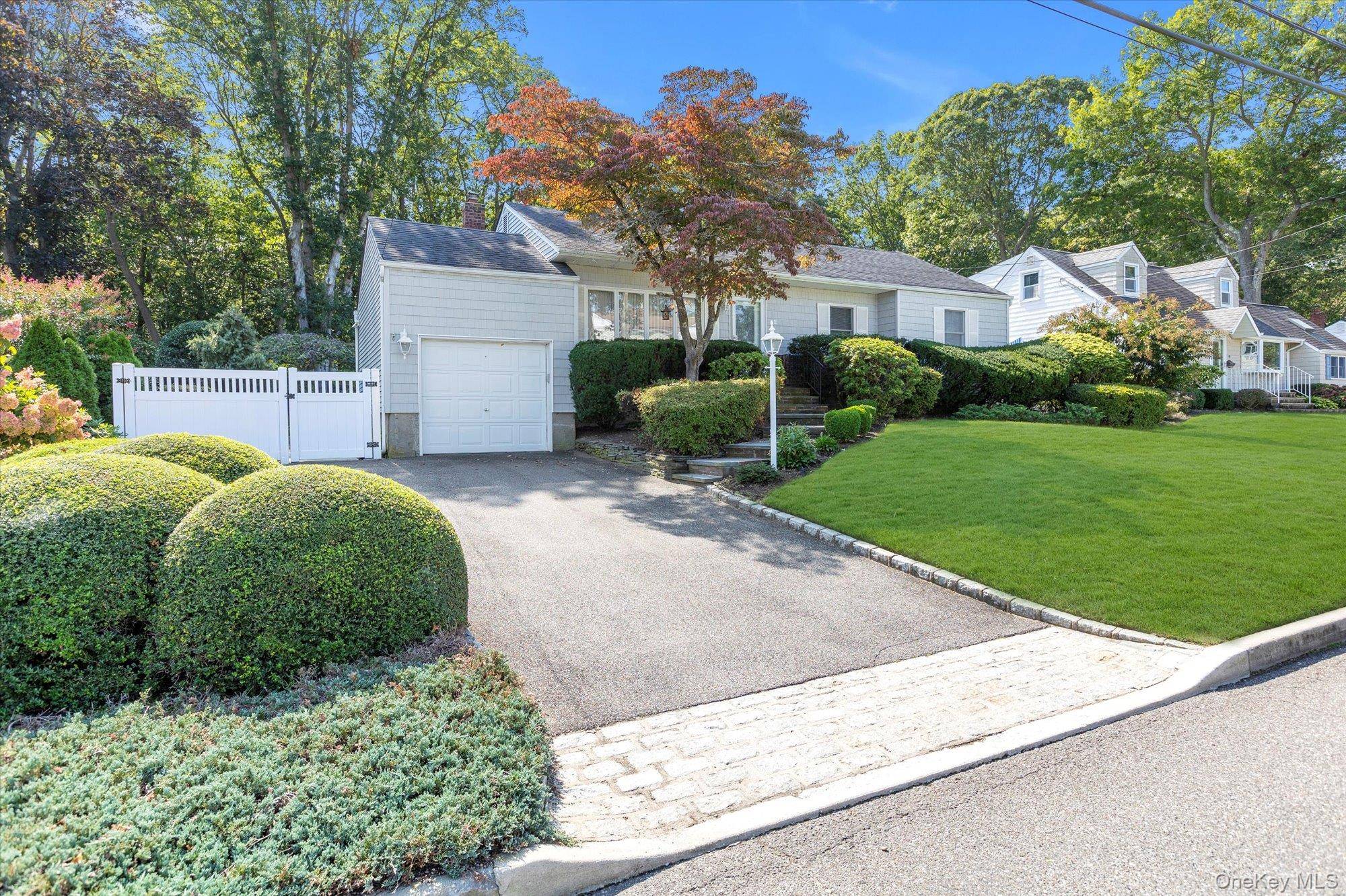 Welcome to this charming 3 bedroom 2 bathroom ranch located in Kings Park.