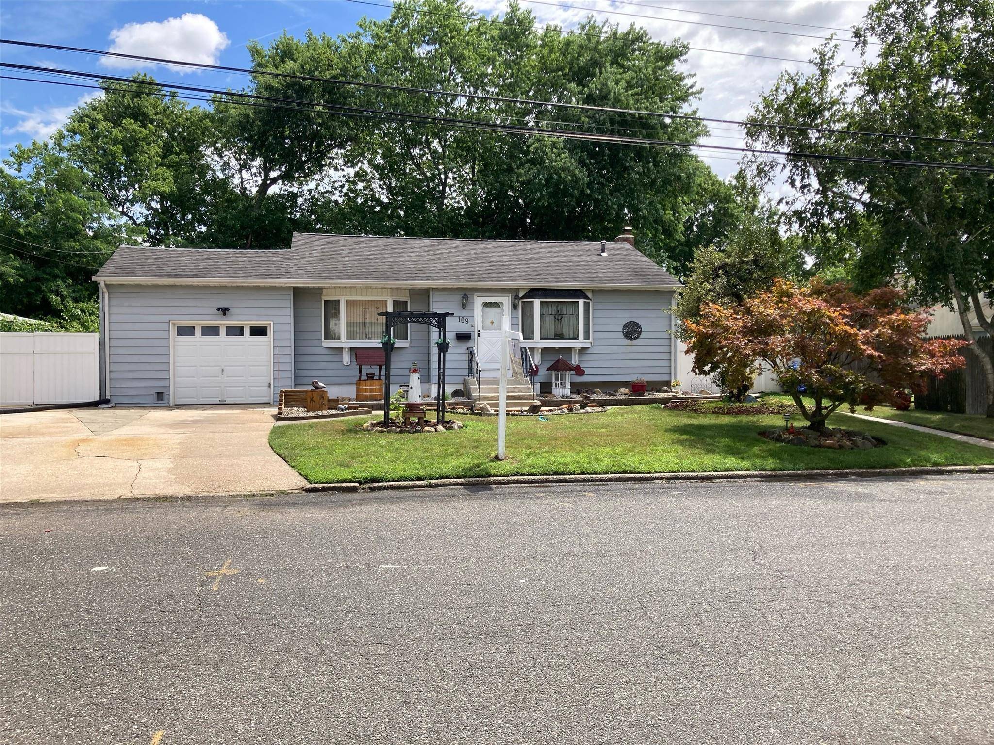 A beautiful expanded large ranch with great curb appeal.