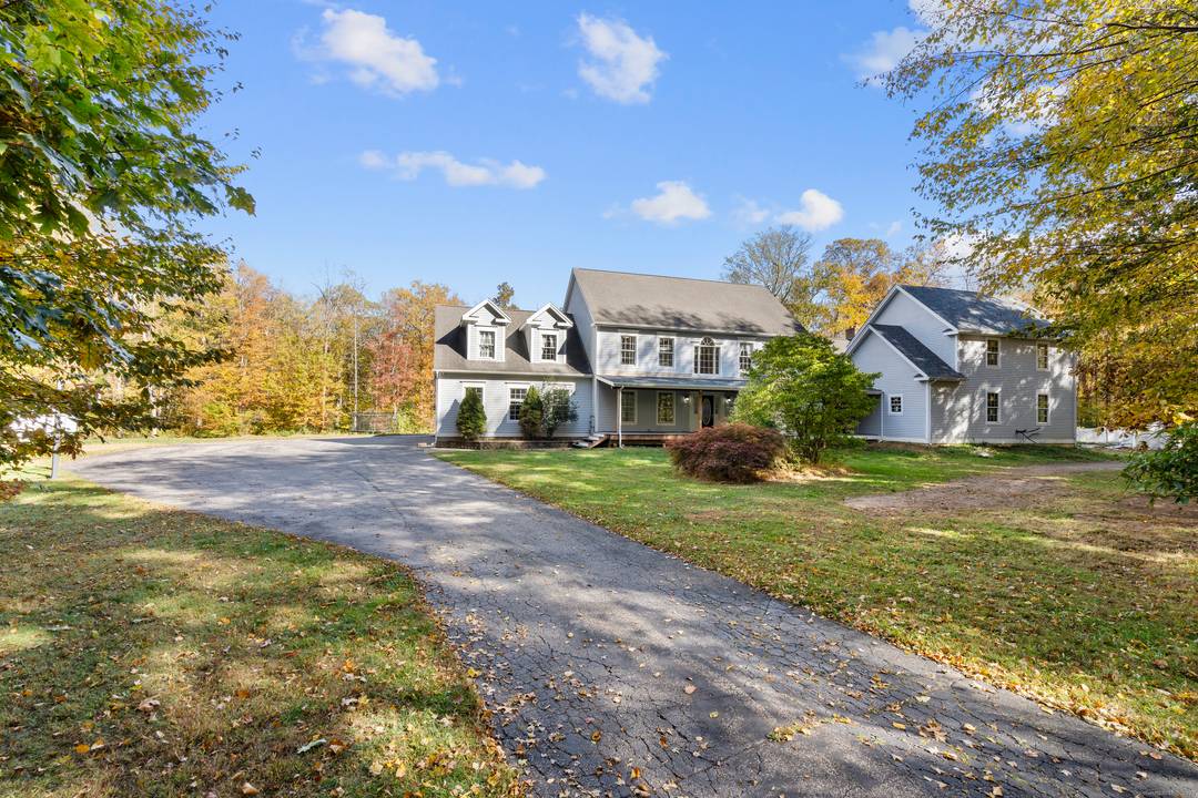 Set on 6. 16 acres across two separate lots, A fully attached legal in law ADU with full sized kitchen, 2 bathrooms, oil heat, mini split hookups, and separate entrance ...