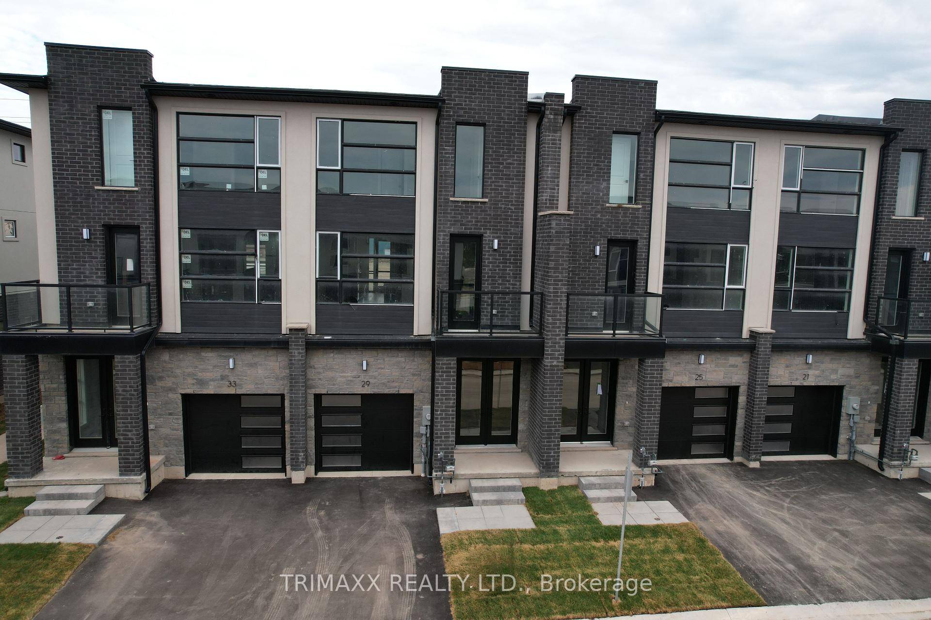 Welcome to 29 Keystone Trail, Welland a fantastic opportunity to lease a contemporary3 storey live work townhouse that perfectly blends modern design with everyday practicality.