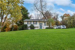 Beautiful, completely updated Raised Ranch style home on half an acre lot.