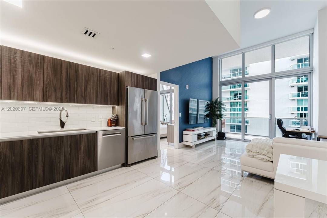 Centrally located in the Arts and Entertainment District with waterfront views and finished with luxurious details at the coveted Aria on the Bay, we proudly bring you unit 1205.