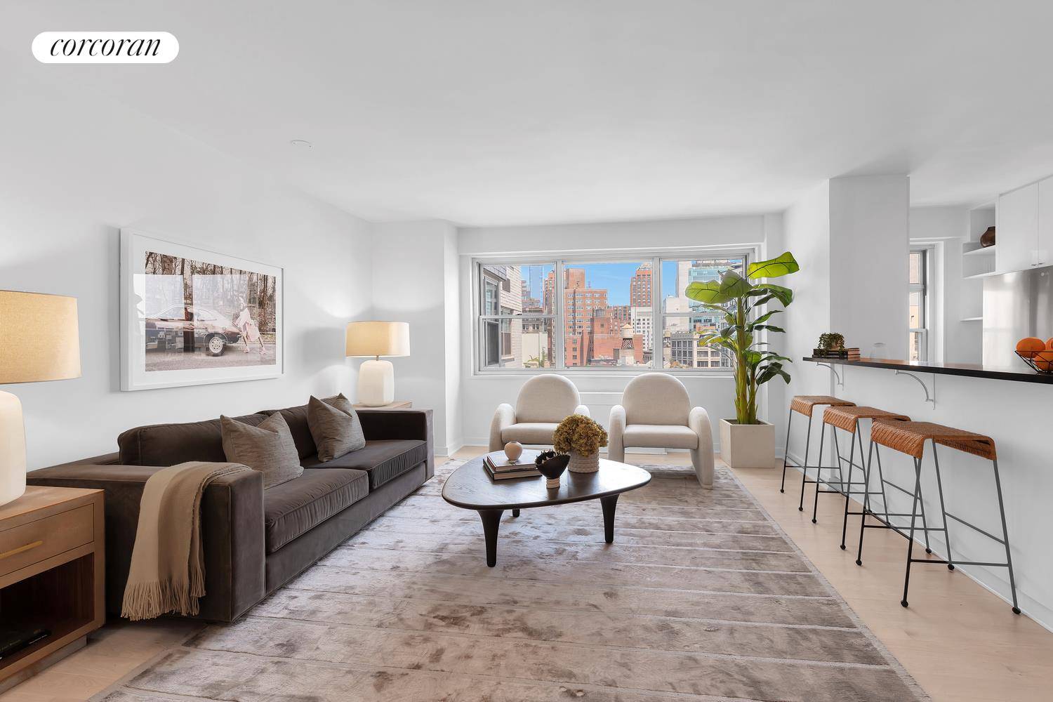 Apartment 14T at The Stewart House is a sun drenched, high floor, massive one bedroom home in mint condition with spectacular open city views from every window.