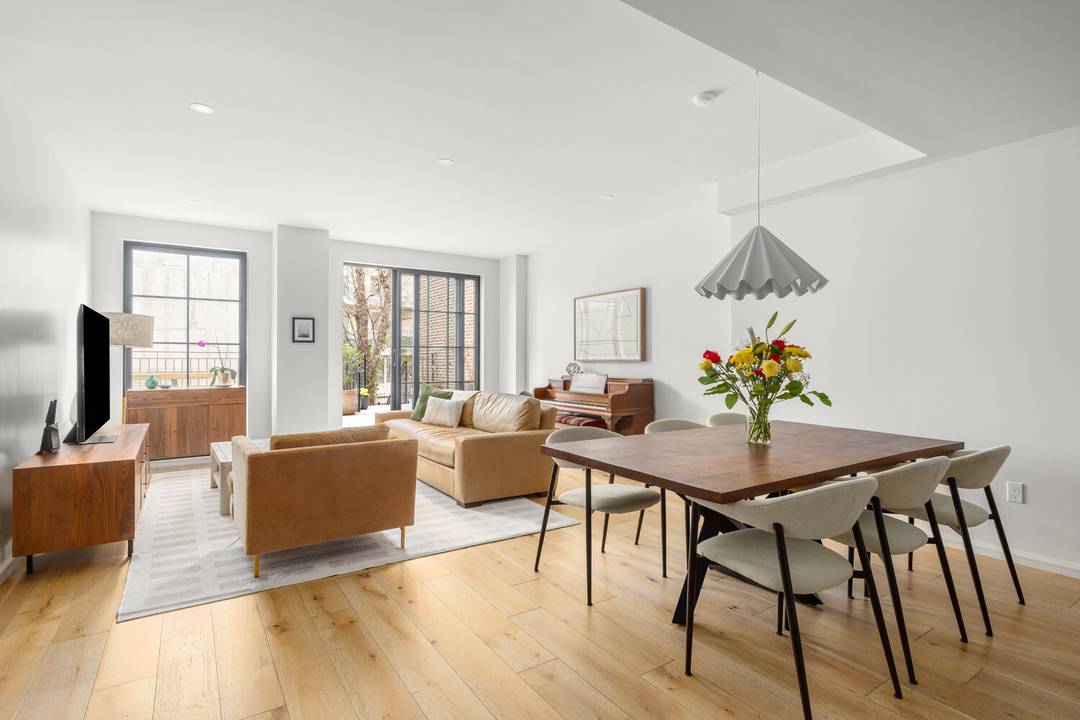 PRIVATE backyard terrace, PRIVATE parking, PRIVATE storage !