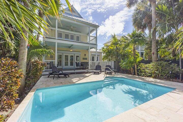 Discover the elegance of The Sanctuary at Hawks Cay with this sophisticated 3 bedroom, 2.