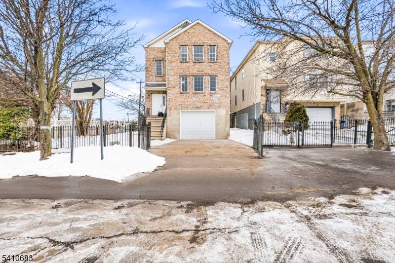 Welcome to 215 Hillside Ave, a beautifully renovated new construction 3 family brick home offering spacious layouts, modern updates, and outstanding income potential in Newark.