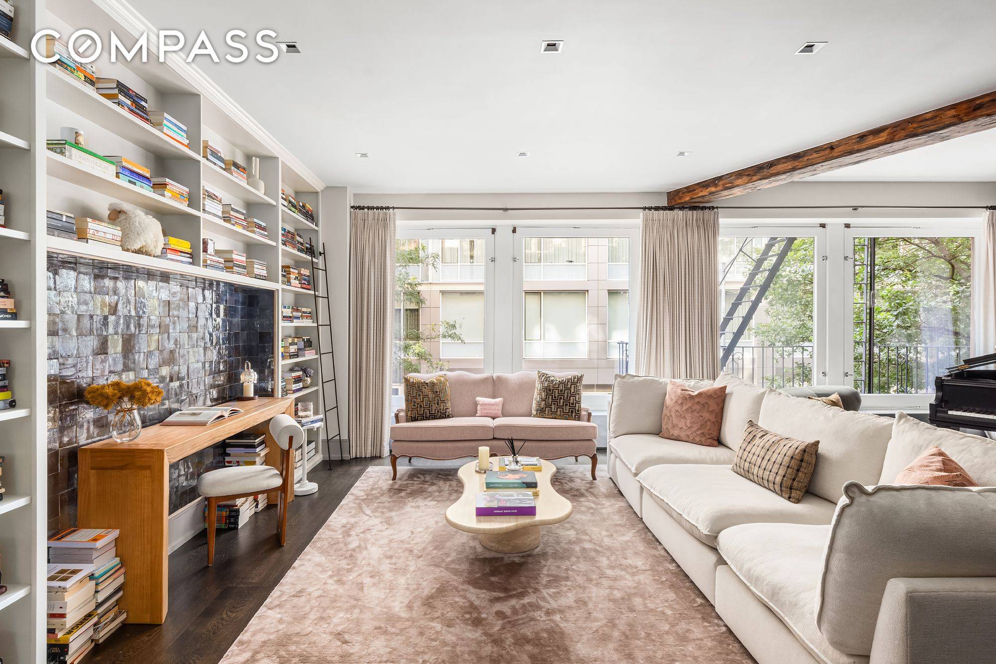 A Sophisticated SoHo Loft with Iconic Views This brilliantly reimagined loft at 14 Wooster Street pairs modern sophistication with the historic charm of SoHo s famed Cast Iron District.