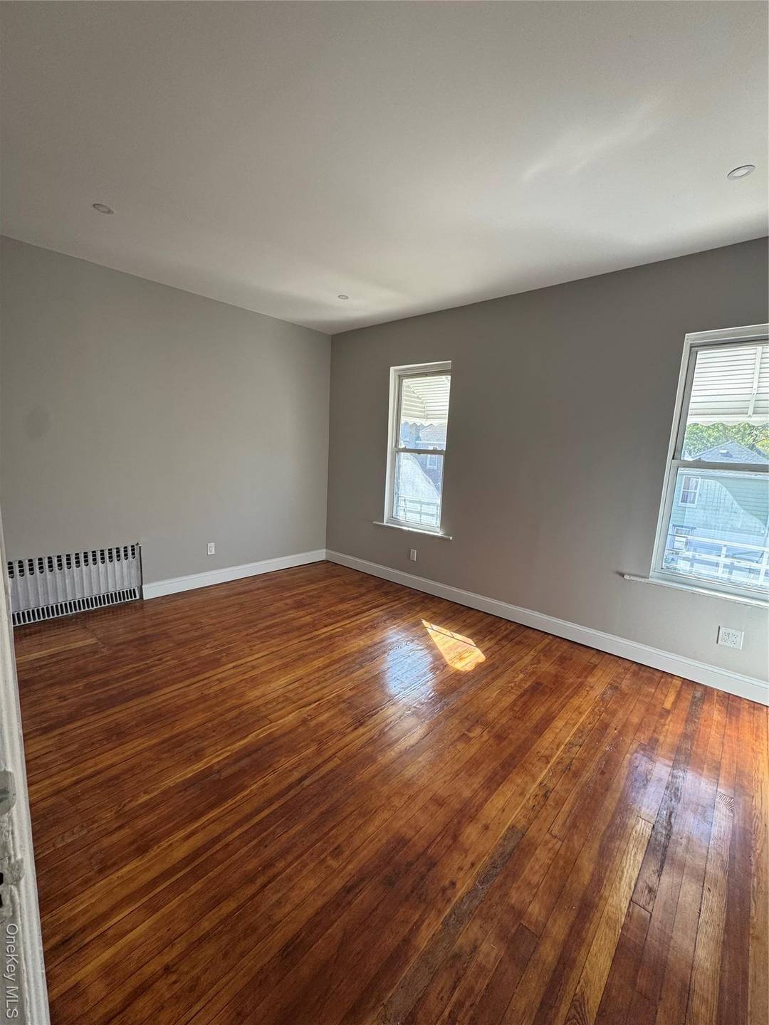 Step into modern comfort and style in this freshly painted, sun filled 3 bedroom, 1 bathroom unit on the second floor of a well kept two family home.