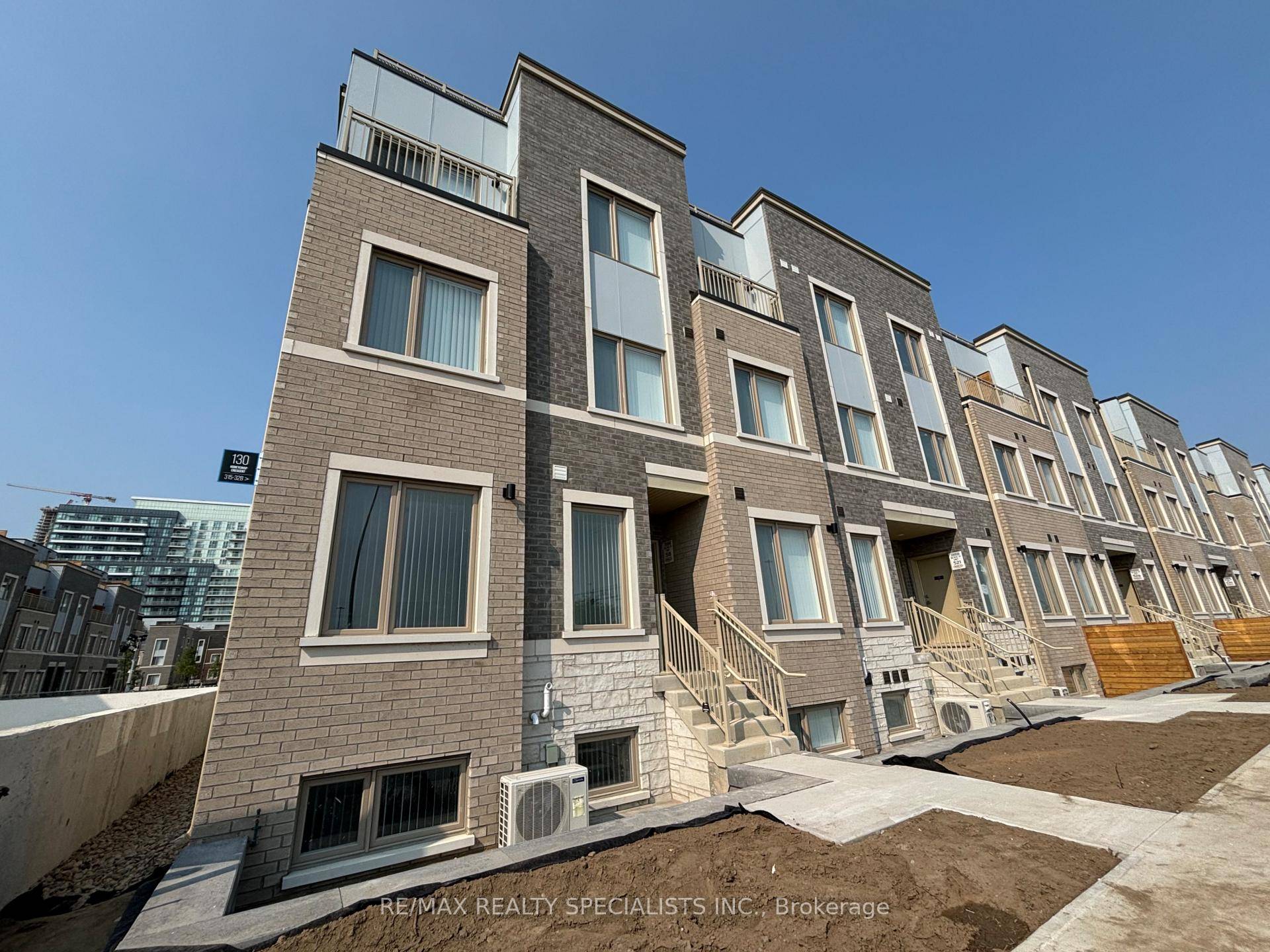 Be proud to call this stunning end unit townhome at M2 Towns by Menkes your home.