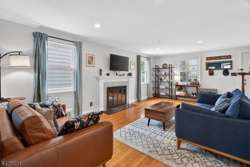 Welcome to 15 Greenwood Ave in West Orange a beautifully updated 3 bedroom, 2 full and 2 half bath center hall colonial home nestled on a gorgeous, tree lined quiet ...