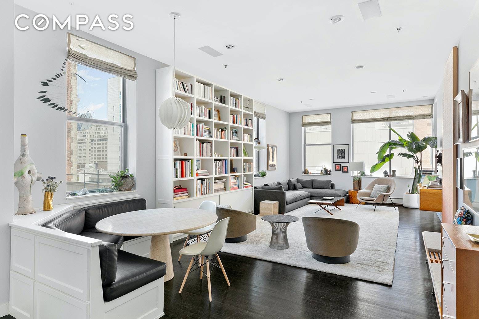 Sleek, 4 bedroom 2 bathroom Condo with 1, 965 sq ft of living space and soaring ceilings located in the heart of The Village.