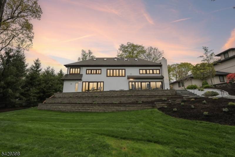 Step into timeless elegance with this beautifully updated Colonial Tudor style home in sought after Englewood.