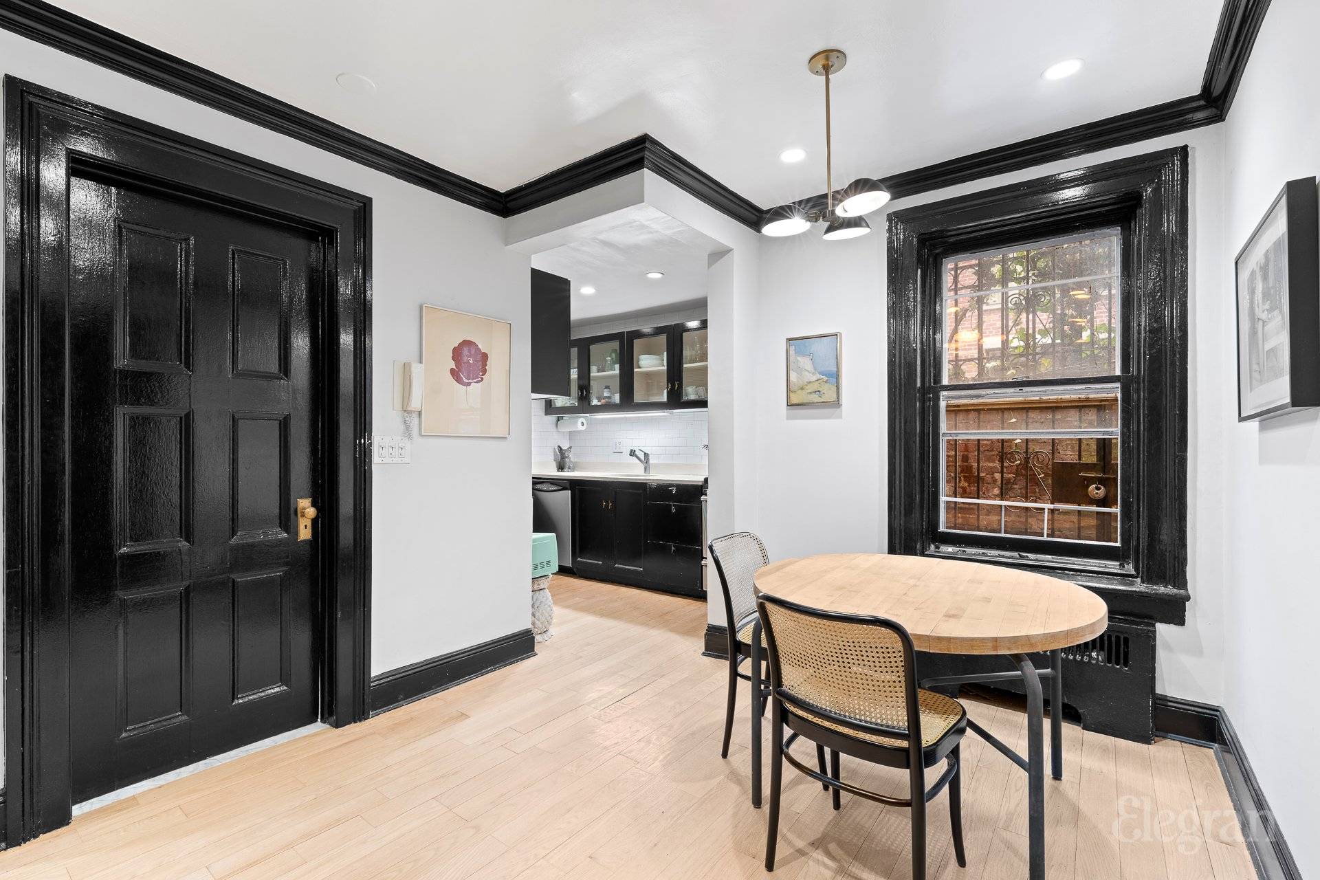 Nestled on a picturesque Gold Coast block, this charming two bedroom home at 17 West 10th Street blends classic elegance with modern updates.